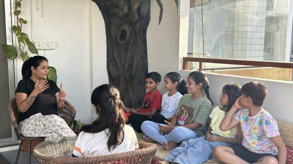 Emotional education coach helping children understand and manage academic stress